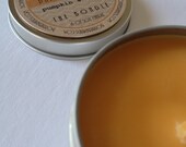 The Bondle: 6 oz Pumpkin Roll Soy Candle flavored with Pumpkin & Spice in a Seamless Travel Tin