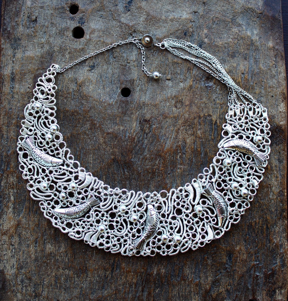 Silver Plated Lacy and Summery Bib Necklace Dancing fish. Example