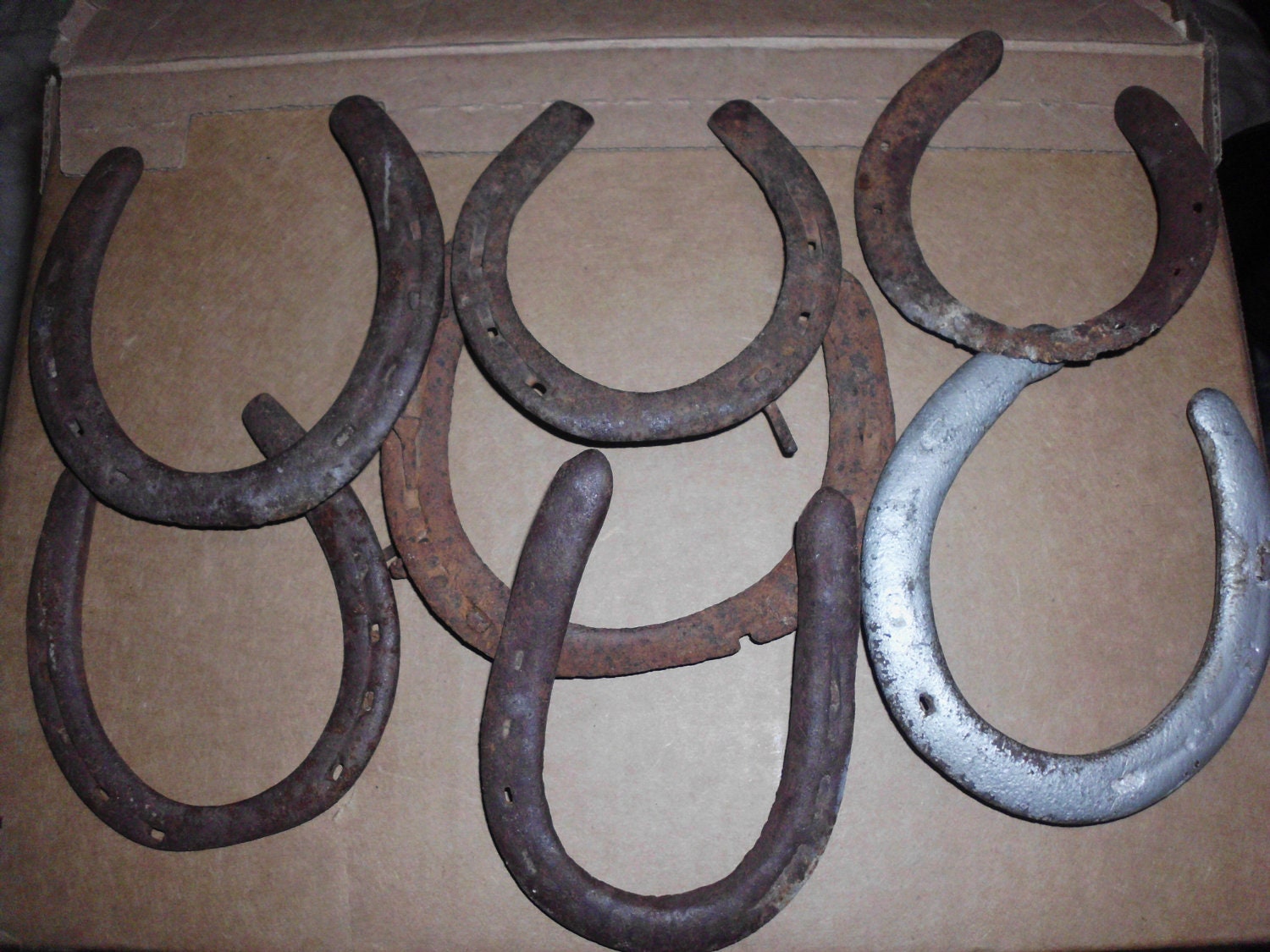Items similar to Antique Seven Real Horseshoes on Etsy