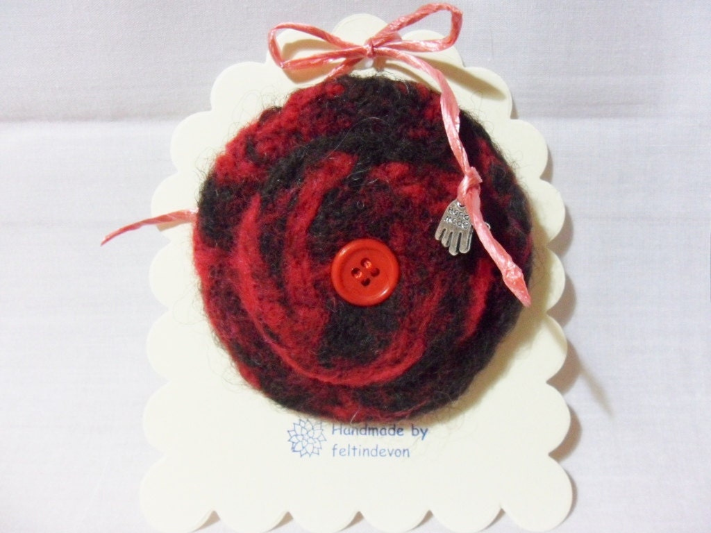 needle felted brooch  - black & red swirls with button centre - 100% merino wool - red and black brooch