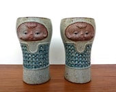 Pair of Eclectic Face Vases