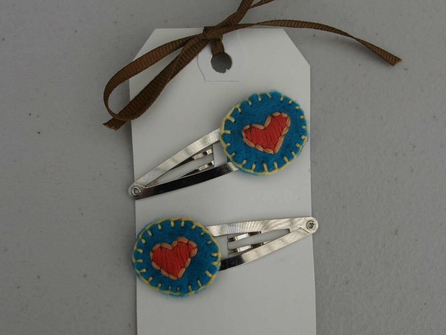 Hand embroidered felt snap clips, set of two