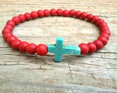 Turquoise cross bracelet with red beads