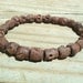 Brown wooden skull bracelet