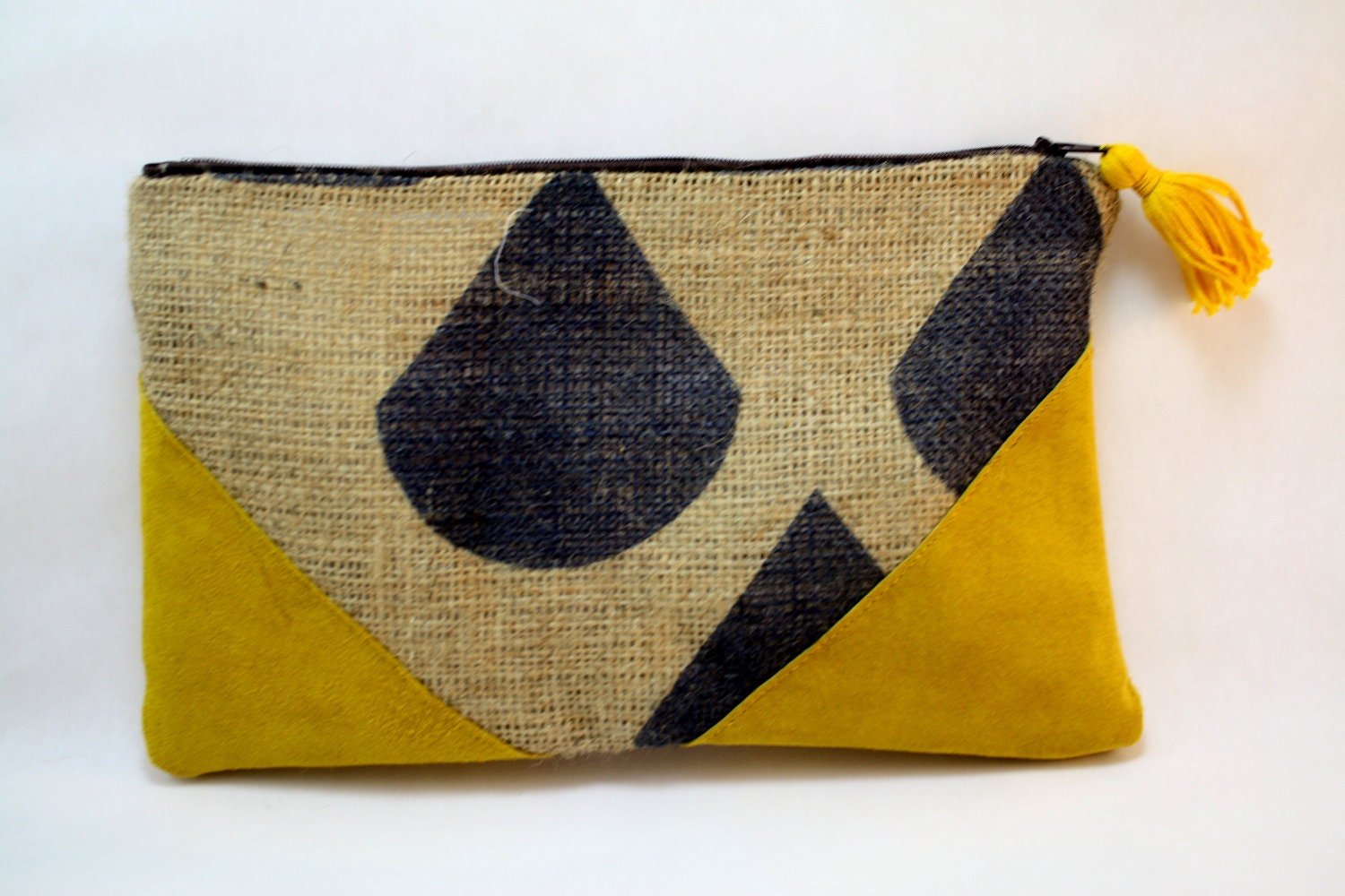 Repurposed burlap coffee bag with mustard colored suede and tassel zipper pull