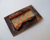 Copper brooch woven with sheet metal, copper foil, and paper