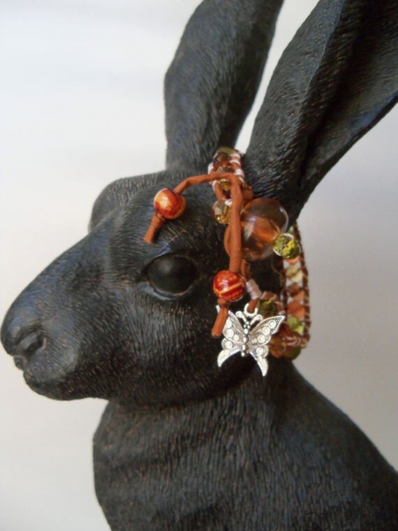 Chez glass and silk cord wrapped bracelet