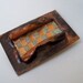 Copper brooch woven with sheet metal, copper foil, and paper