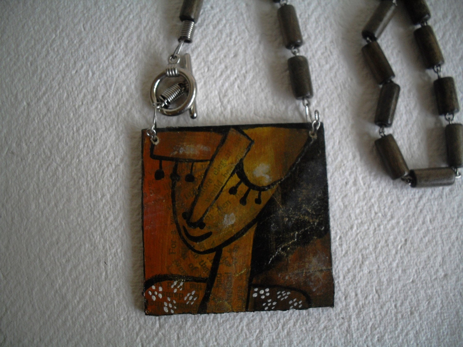 Square MDF Pendant - Hand Painted Face in brown, Black with closed eye and dull gold chain