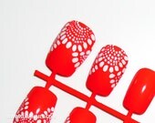 Lacey Loo Rojo 12 neon red Nails with a lace pattern