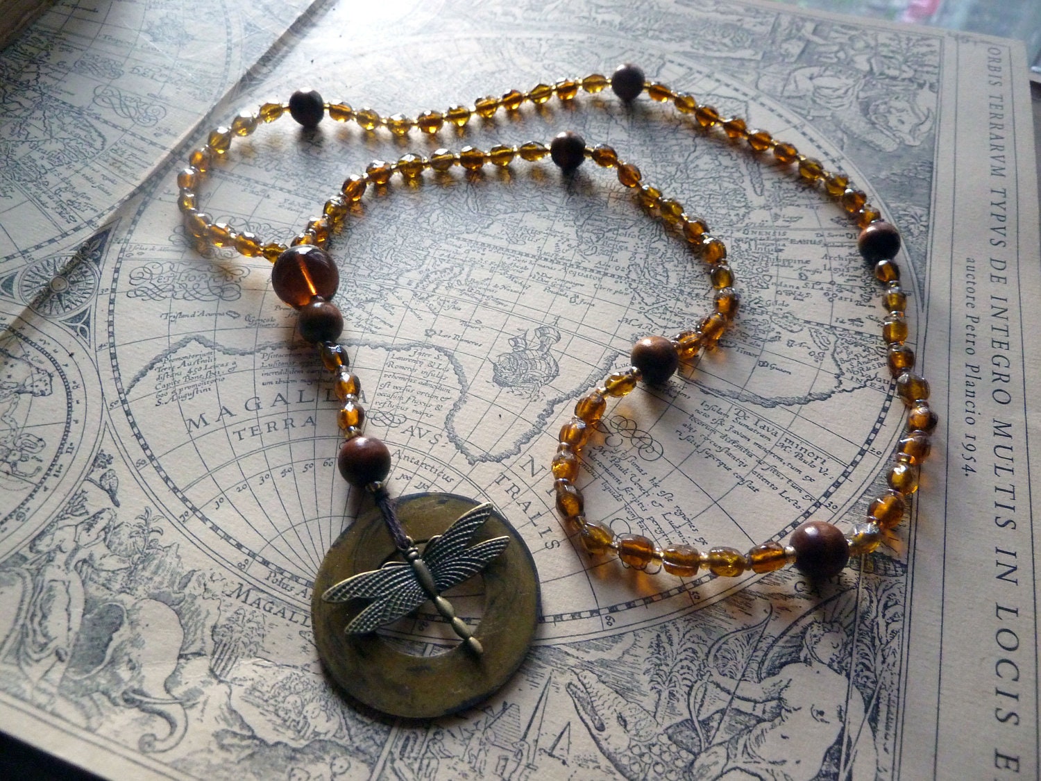Rosary inspired necklace with golden glass beads and dragonfly charm