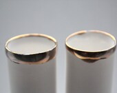 Thin tall tube vase made out of stoneware English fine bone china and real gold