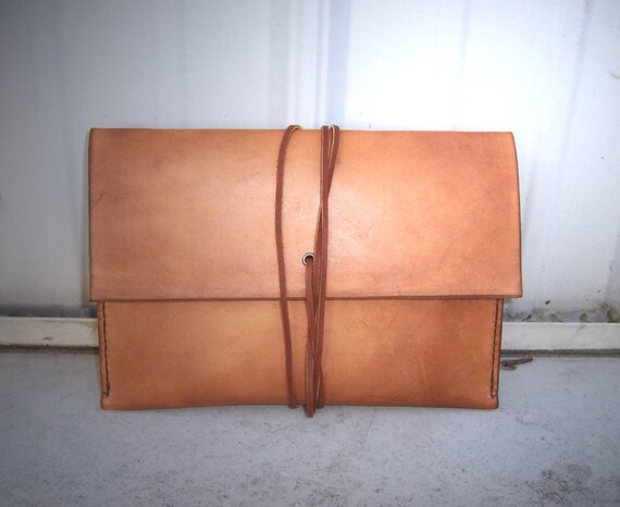 IPAD mini Leather Sleeve in Full Grain Veg Tan Leather . Hand Made in the USA from US sourced materials.