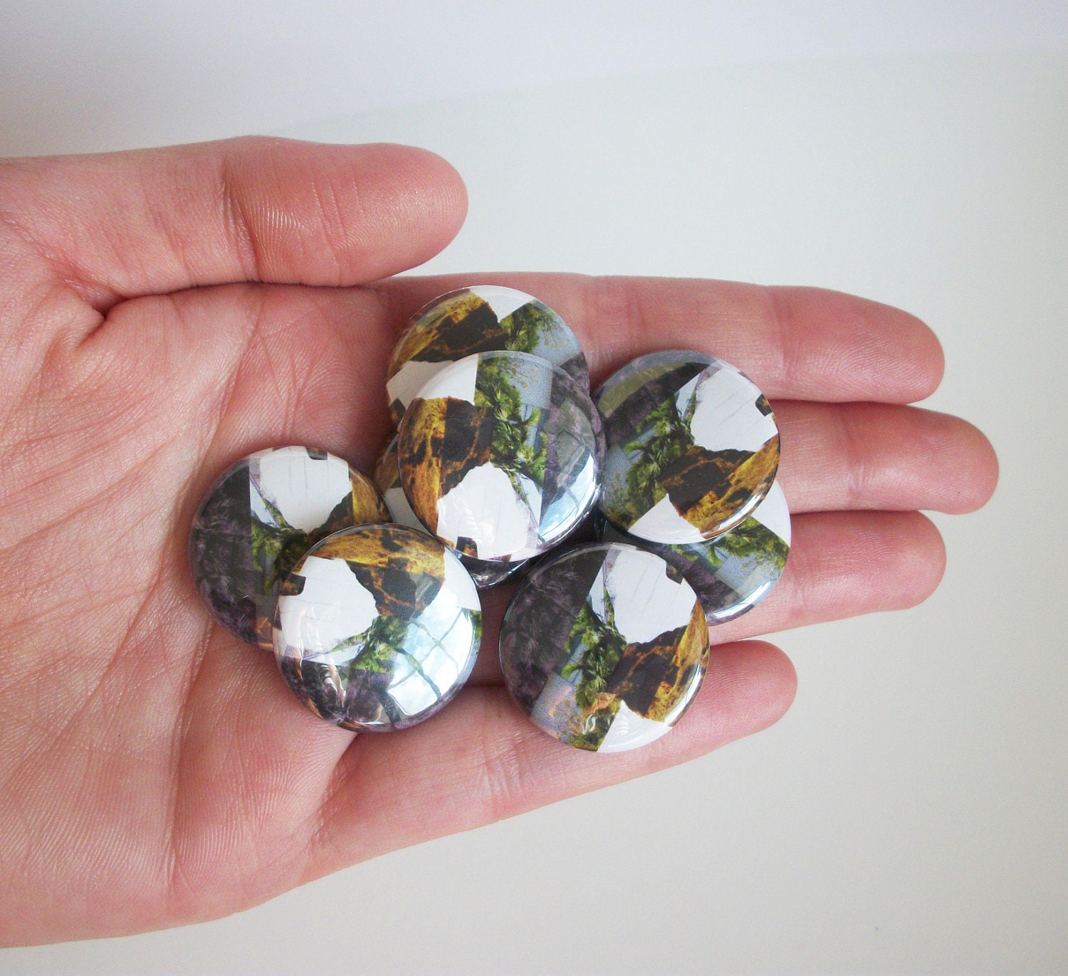 Landscape travel collage button badge. Indie art quirky pin back badge.indie button badge.pin badge.
