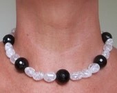 18 mm Faceted Black Onyx and 12 x 16 mm Explosion Crystal 18 inch necklace with Sterling Silver Findings and matching earrings