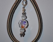 Coil Pendant with Multifaceted bead