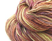 Handspun yarn sport weight merino silk sparkle hand painted gold rust red lavender yellow single ply 4.6 oz., 480 yds. Evening Marigold