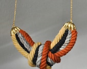 Eco - friendly fashion urban necklace.Brown,yellow,dark blue and gray cotton rope,big knot and gold colored nickel free chain.Ready to ship.