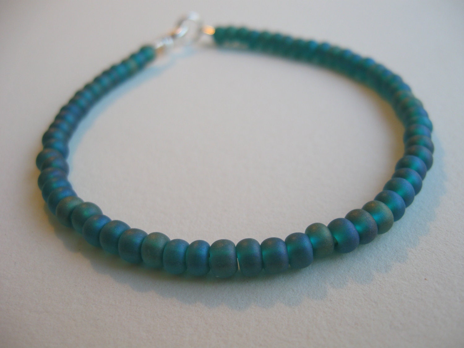 6/0 Teal Rainbow Frosted Glass Bead Bracelet