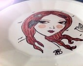 Botticelli-esqe red head on this unique art plate