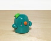 Teal Green Bird Figurine