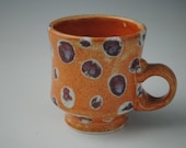 Orange Stoneware Coffee Mug with Purple Blue Spots