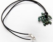 Peace Turtle in Caribbean green with leather cord