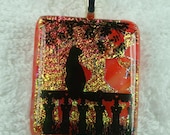 Cat on the balcony watching the sunset fused dichroic glass necklace orange pink green yellow 1577