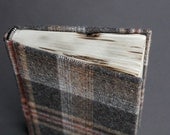 Woolen camping journal with tartan pattern