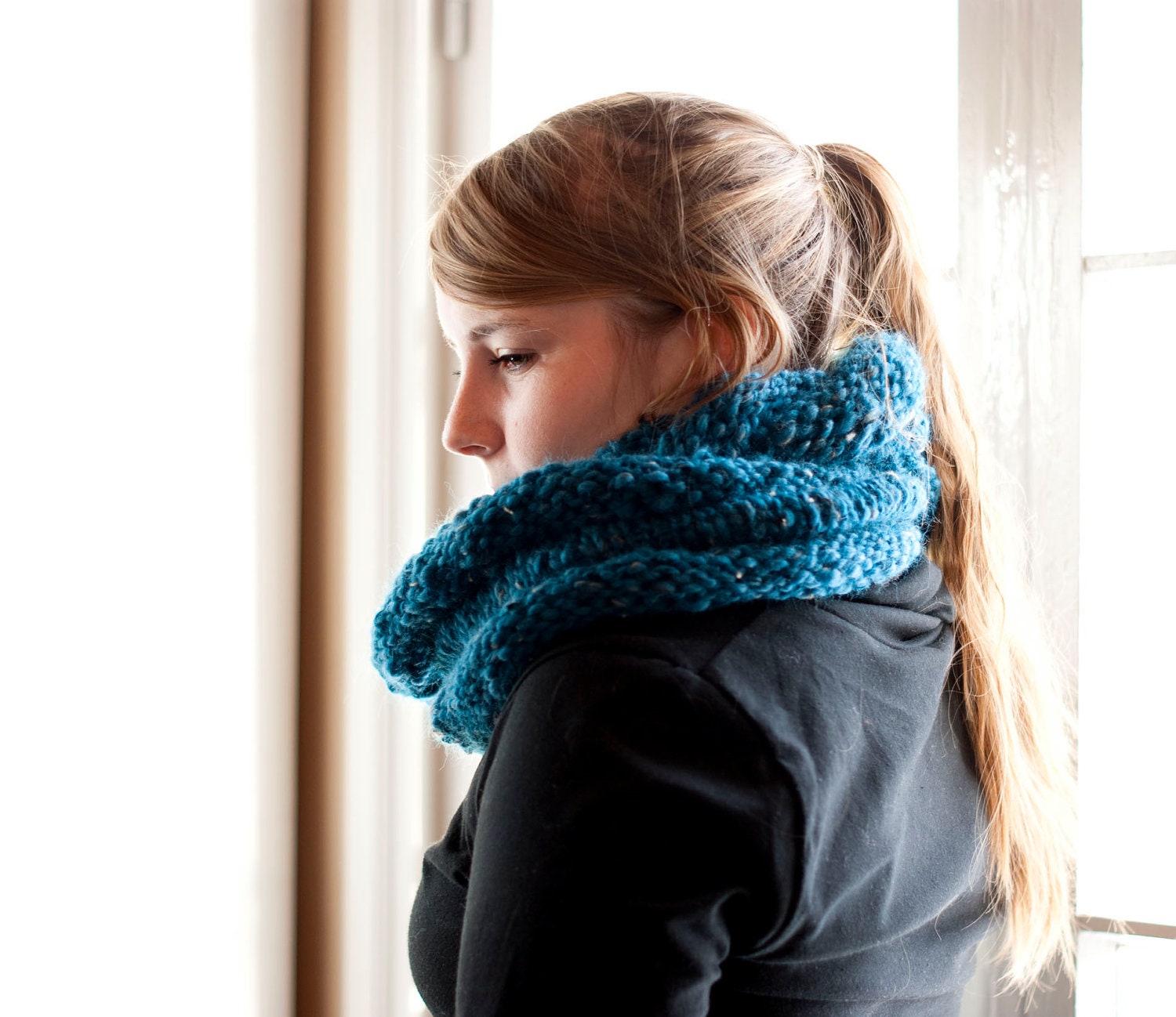 Warm hand knit snood in teal with rolled edges. Cozy and chunky cowl, infinity scarf or neck warmer.