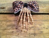 Skeleton hand with leopard bow halloween hair clip