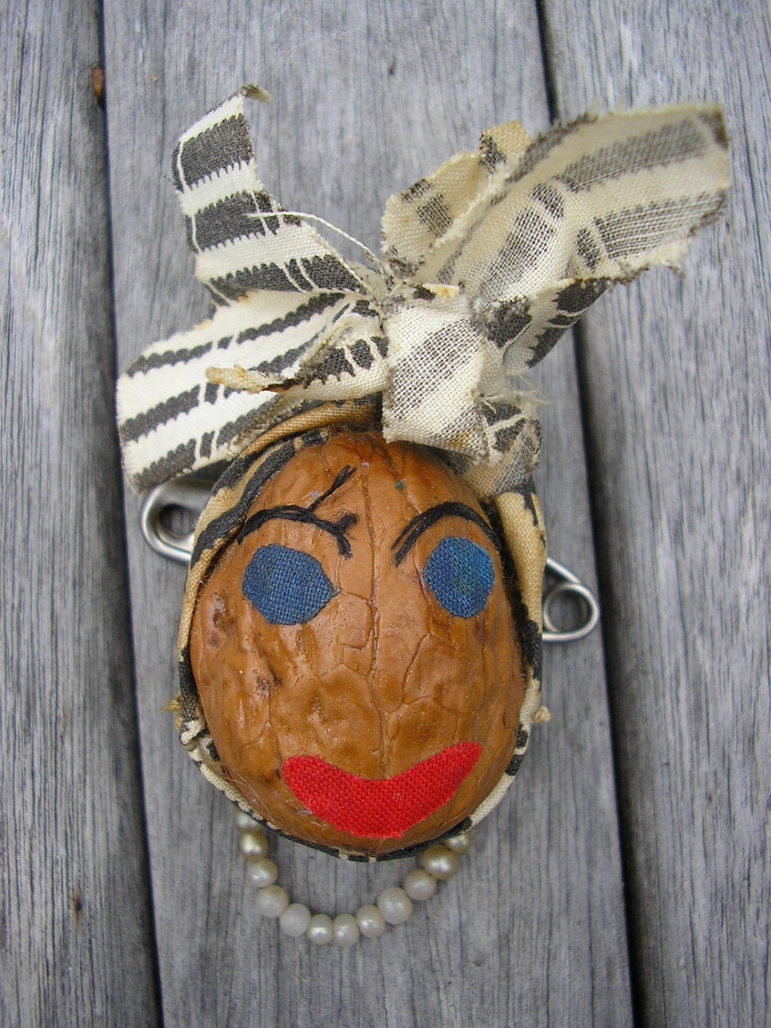 Black Folk Art Walnut Head Brooch