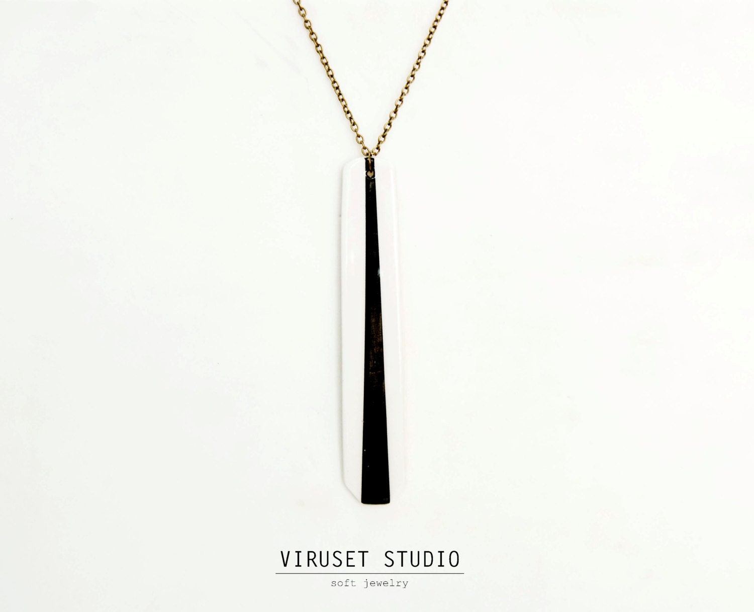 Ceramic necklace black & white inspired by Africa.  Tribal jewelry handmade by Viruset Studio Ceramic Jewelry