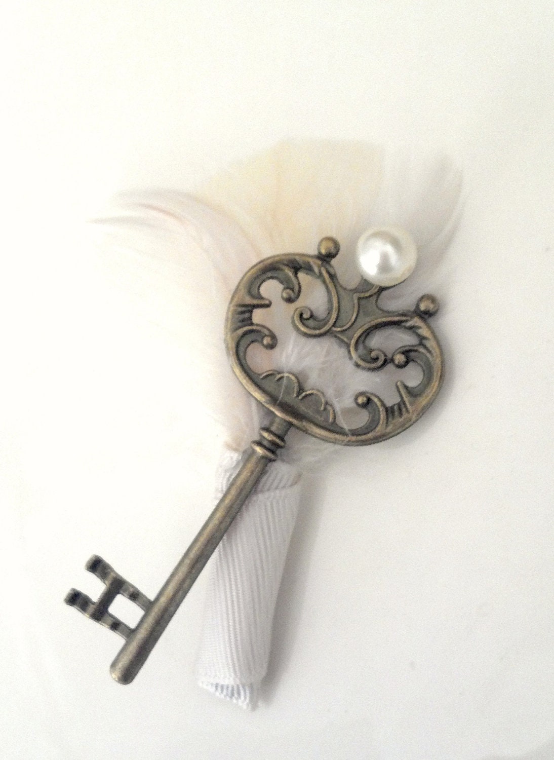 Boutonniere-Vintage inspired with skeleton key, pearl, and ivory feathers