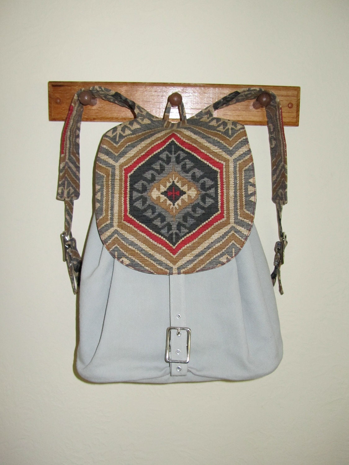 Handmade Backpack with secret compartment by NeedlewinkStitchery