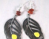 Pewter feather earrings with yellow accents and sponge coral chips