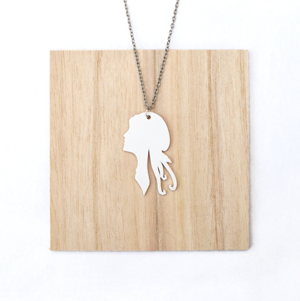 White Boho Woman Silhouette Necklace, Whimsical, 16 inch chain, plastic, cameo, wind, hair, hat, feather