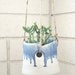 white and blue hanging planter