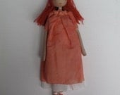 Tulip, ooak small art doll with red hair and hand-coloured pink/orange dress.