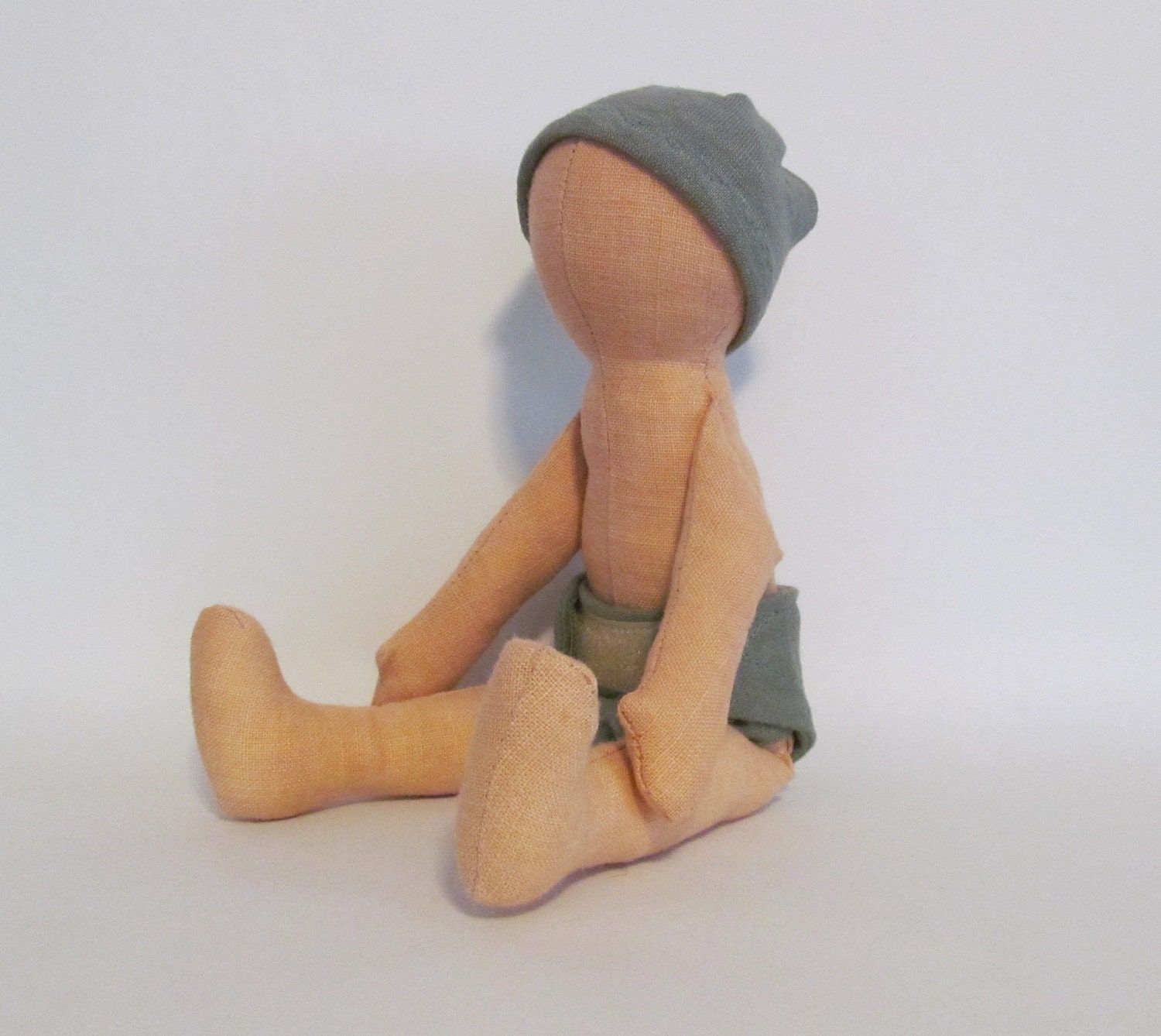 11" Peach eco baby doll with five diaper color options