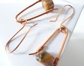 Hammered solid copper wire into a funky shape and red jasper stones, soho, boho, hippie, handmade earrings