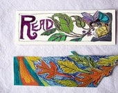 Two book marks orange and yellow leaves and Reading Fairy pen and ink drawings