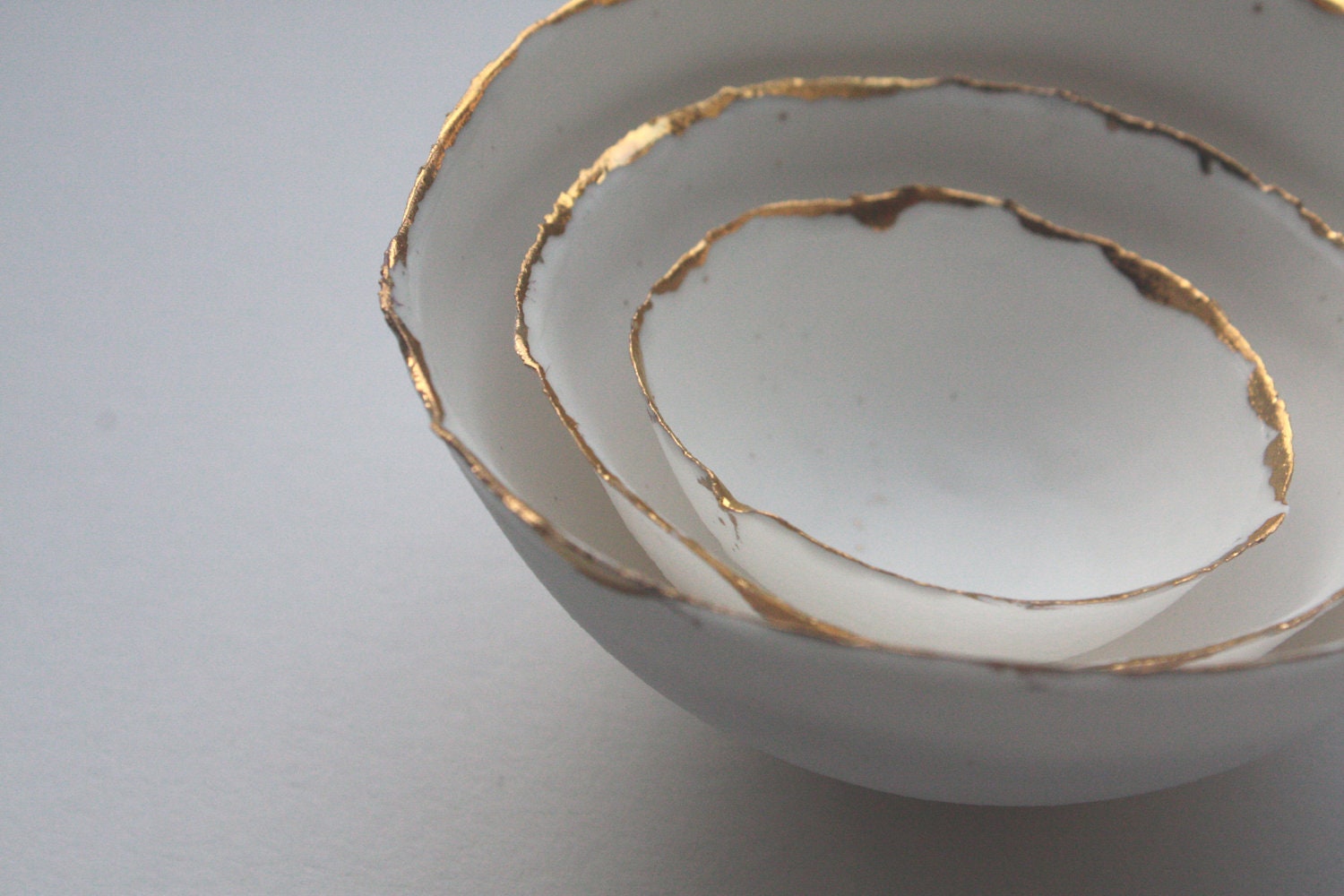 Set of 3 English fine bone china nesting stoneware bowls with real gold.