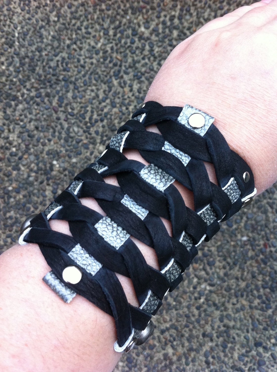 Twisted Glad - Gladiator Style Black Leather Bracer Cuff Woven with Embossed Pewter Leather in Stingray Pattern and Silver Rivet Studs.