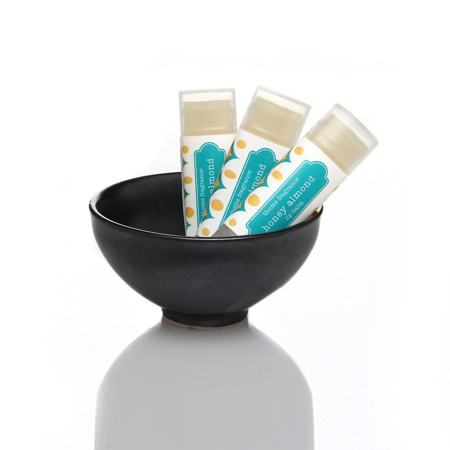 Honey Almond glossy lip balm tube. Best lip balm ever.