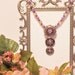 Pop of Purple with an Oh So Feminine Flair in this Purple Crystal, Pearl and Glass Necklace with Three Tier Pendant