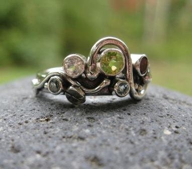 unique mother's ring. 4 or 5 birthstones set in sterling silver ...