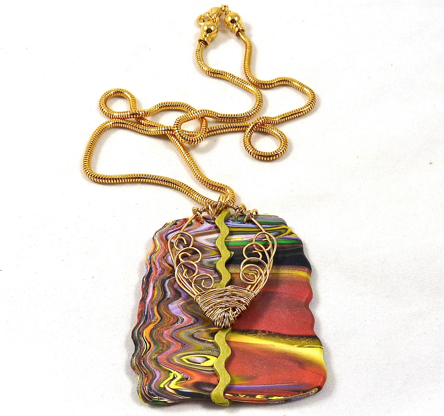 Work of Art Pendant made from Polymer Clay and Gold Wirework Olive Green and Swirls of Color
