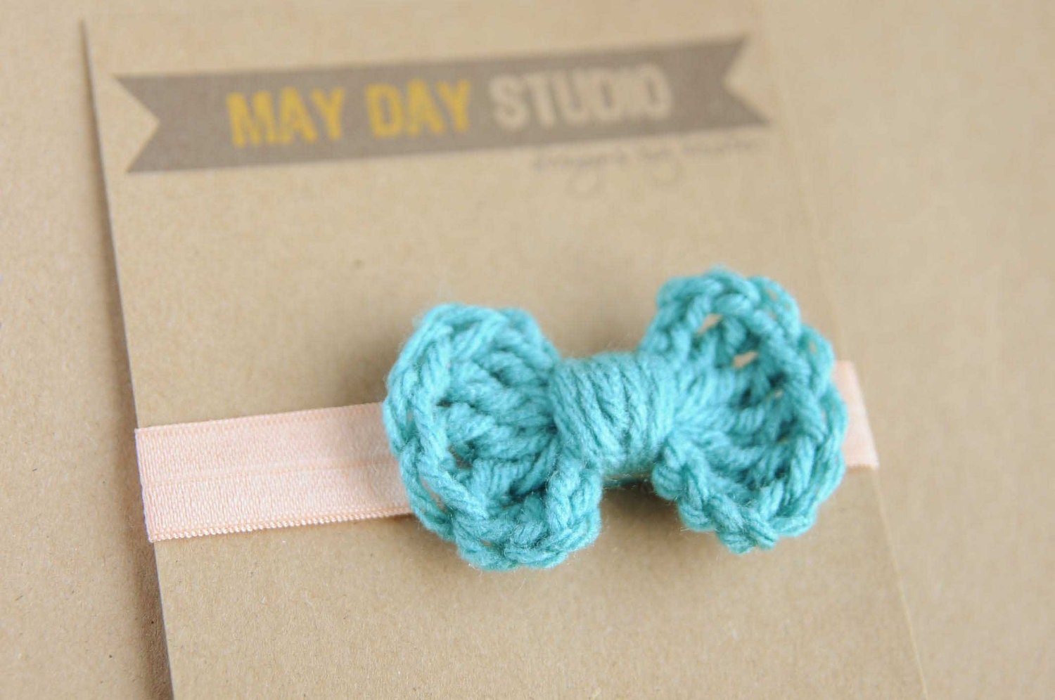 newborn baby toddler girls crochet bow elastic headband - blue crochet bow on peach elastic