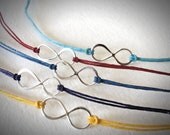 Sterling Infinity bracelet on linen